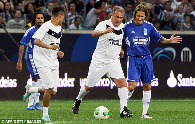 Veteran: Michel Salgado appears to let Zico get the run on him during the UNDP-organised match in Porto Alegre