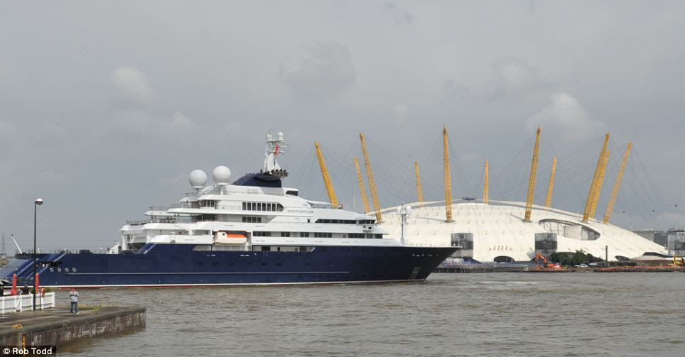 Cruising: Octopus passes the O2 dome on it's way into Canary Wharf where preparation for the arrival of the owner began