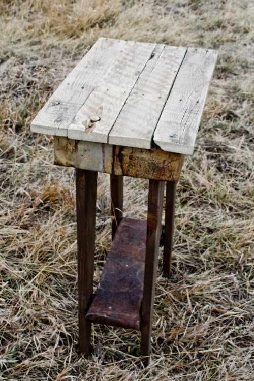 Occasional Table. 24 1/2″ x 14″. Crafted from reclaimed wood pallets and old mine tin. $60