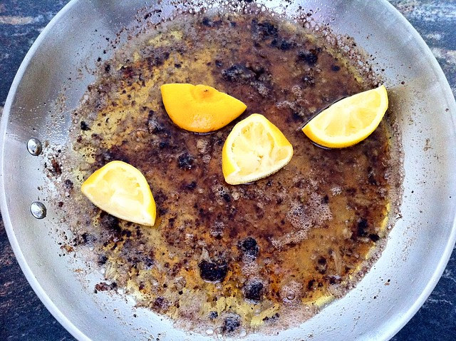 Lemon Rind Quarters Added to Pan Sauce