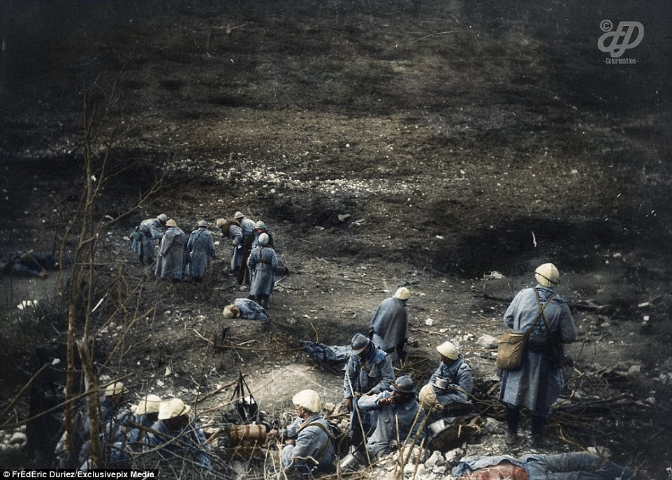 After fighting during the Battle of Verdun in 1916, soldiers surrounded the bodies of their comrades. Verdun was the longest battle of the First World War, lasting 300 days and leaving an estimated 800,000 soldiers dead, wounded or missing