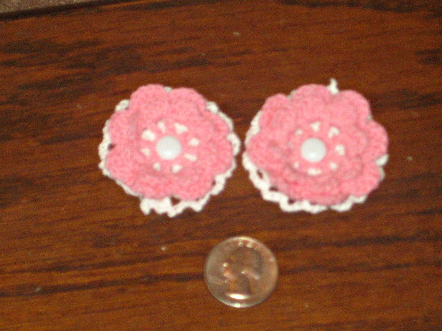 pink and white crocheted flower hair clips