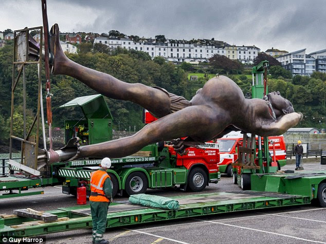 Dropping in: Damien Hirst's Verity bronze statue of a pregnant woman has arrived in Ilfracombe, Devon