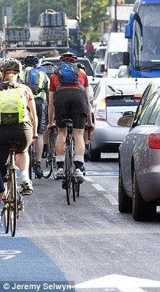 Cyclists in traffic