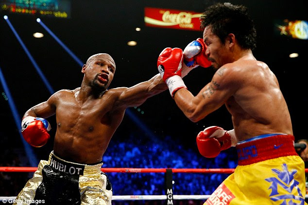 Mayweather (left) last fought in May when he defeated Manny Pacquiao in a welterweight unification bout
