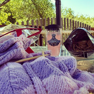 View from my little corner of the world right now... #bruins #crystallight #knitting #yarn #knitstagram #PopCorners #deck #spring