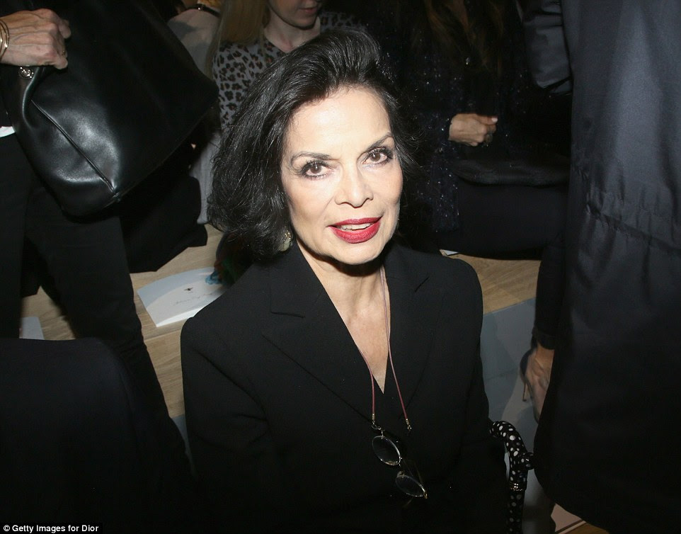 Still got it: Bianca Jagger, 71, was elegant in a black blazer as she took her seat on the front row