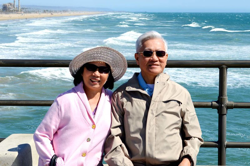 Parents on the windy pier