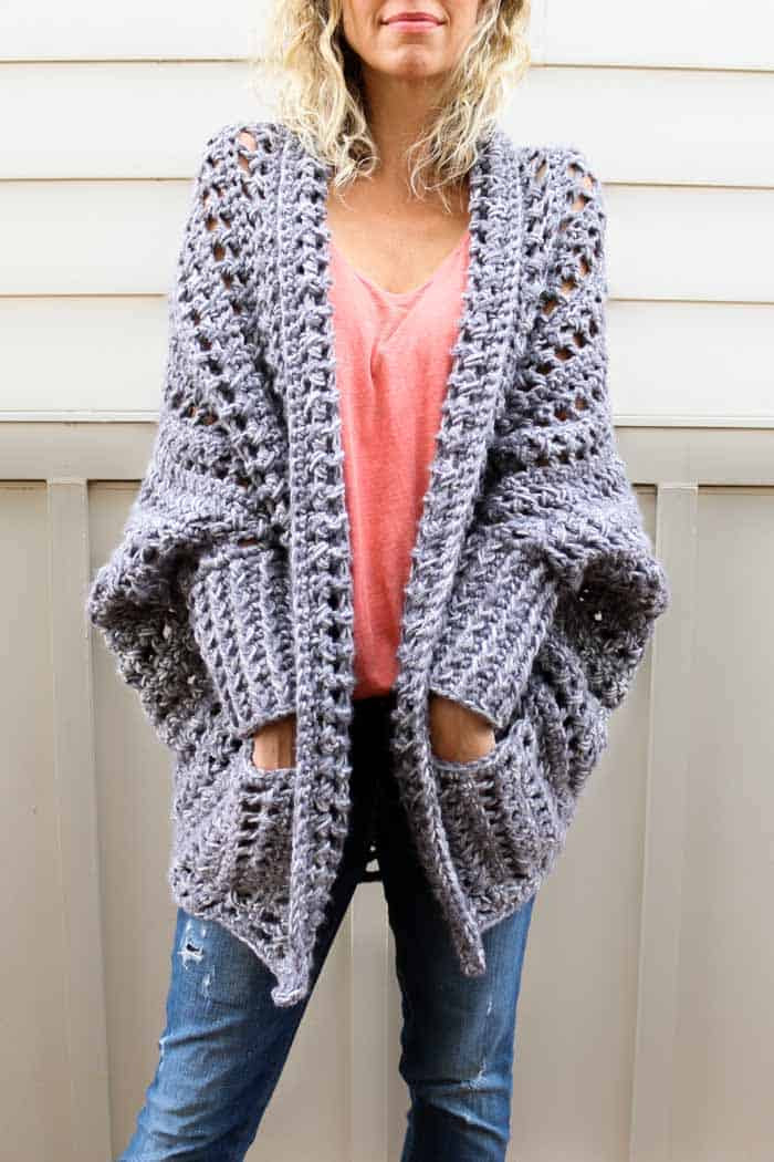 Creatively constructed from a simple rectangle, this flattering chunky crochet sweater comes together easily with zero shaping, increasing or decreasing. Free pattern from Make & Do Crew featuring Lion Brand Wool-Ease Tonal yarn.