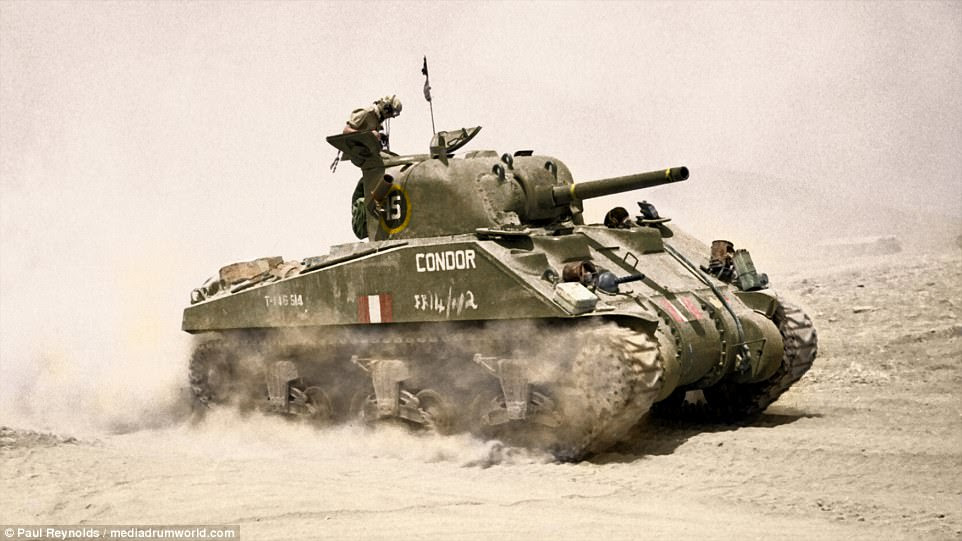 A British Sherman tank advancing near Catania, Sicily, on August 4, 1943. Catania was severely bombed during the Second World War from 1940 until its liberation in August 1943 by the British 8th Army. The Germans evacuated the city on August 5, 1943, but years earlier - starting on June 5, 1940 - around 100,000 people had been moved to neighbouring villages