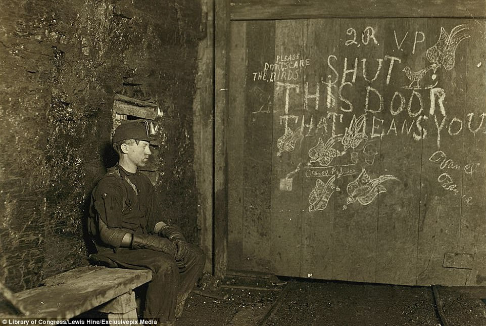Vance, a fifteen-year-old 'trapper boy' was in charge of opening and closing this door for several years at a coal mine in West Virginia. Most of the time, he spent sitting idly in the darkness, waiting for the cars to come. He earned $0.75 a day for 10 hours of work. The words and flying birds sketched on the door next to him went noticed until the photo was developed due to the impenetrable gloom of the cellar