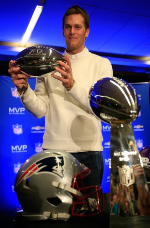 Tom Brady is appealing a four-game suspension for his role in deflate-gate. (Getty Images) 
