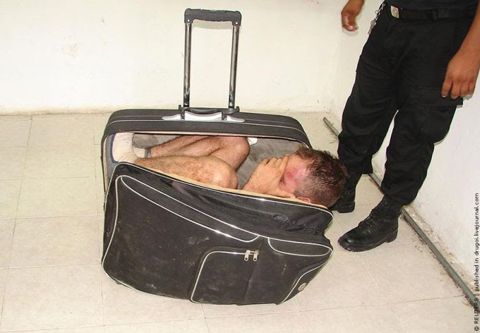 Riddle of the Day. What's Inside the Suitcase? (4 pics)