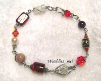 Wire wrapped bracelet Wire wrapped bracelet - red themed