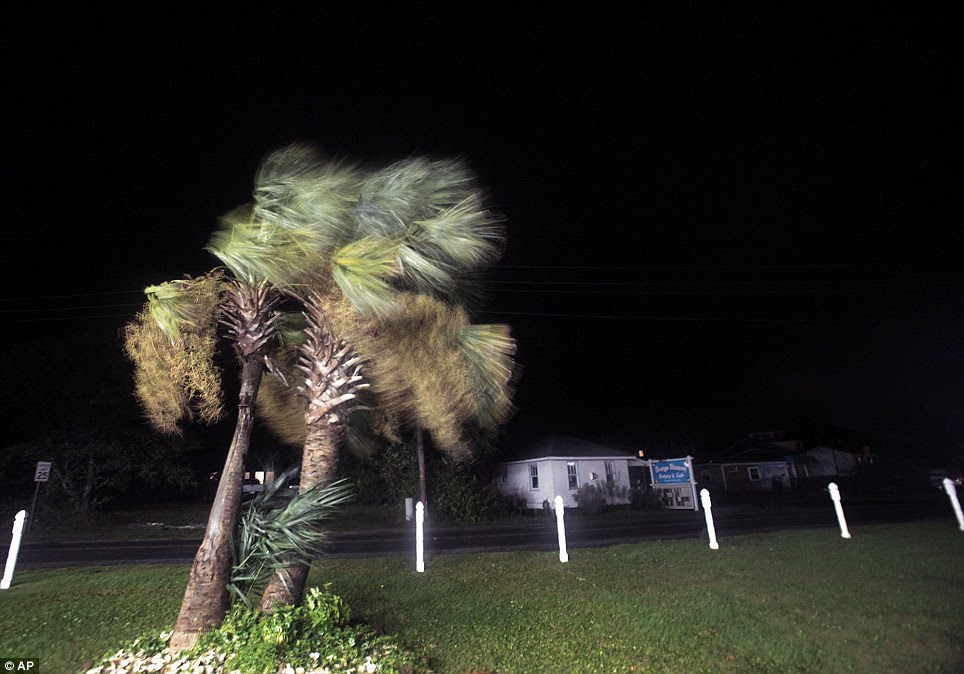 Extreme conditions: A wind from Hurricane Sandy blows through on Hatteras Island, North Carolina, early on Monday