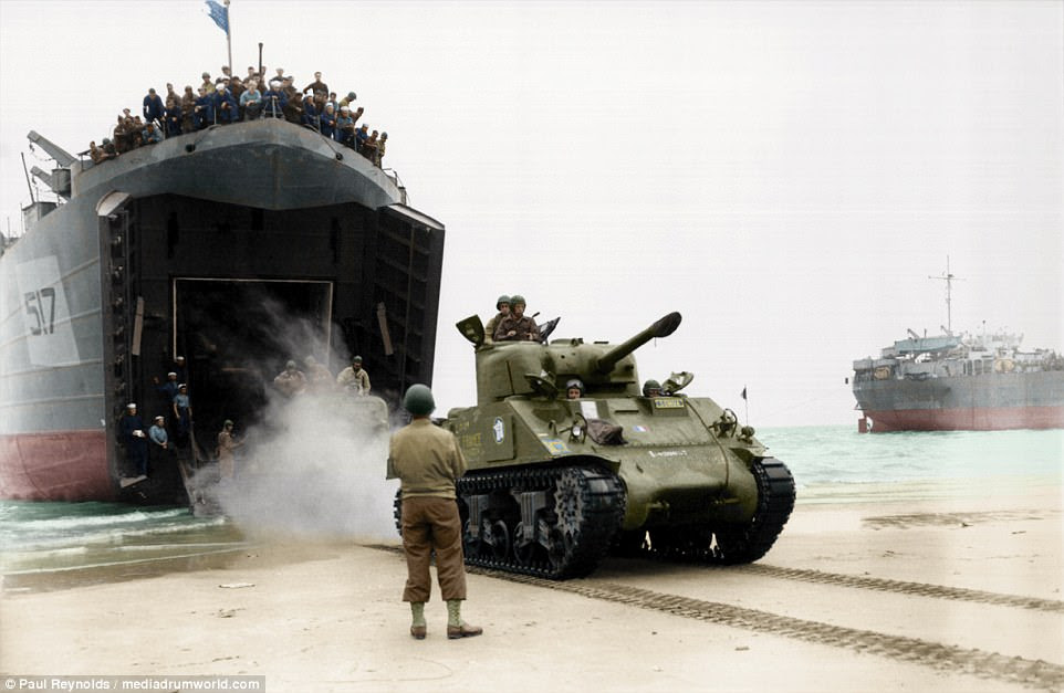 A French Army Sherman tank lands on a beach in Normandy after disembarking from the USS LST-517 on August 2, 1944. Since its design in 1940, an astonishing 49,234 of the ubiquitous Sherman tanks were manufactured. They appeared in the Arab-Israeli wars, the Vietnam War and Indo-Pakistan War of 1965, among many others 