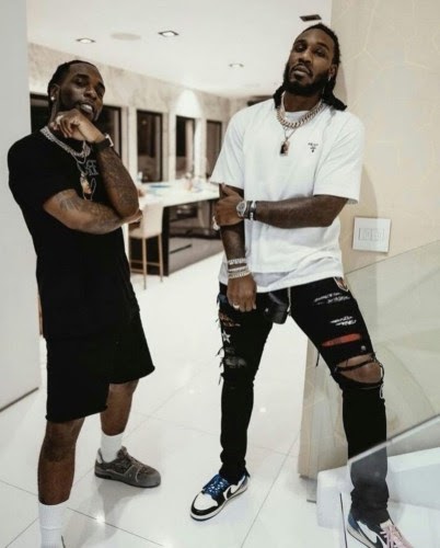Burna Boy Shares Photos of His ‘Twin’ Brother – DO THEY REALLY LOOK ALIKE?