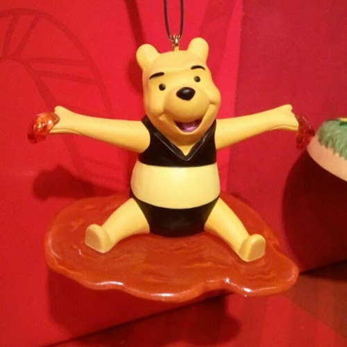 kelbebop:

I think Pooh is supposed to be dressed as a bee, but it looks like he’s sporting a stylish black two-piece. Kudos, Hallmark.
