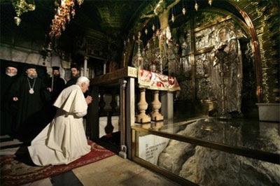 Pope Benedict XVI prays in the Golgotha, or Calvary, the traditional site where Jesus was crucified, in the Church of the Holy Sepulcher, in Jerusalem's Old City, Friday, May 15, 2009. Source: Associated Press