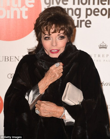 Actress Joan Collins has been forced to evacuate her villa in the south of France as a huge fire continues to rip through woodland near Saint-Tropez