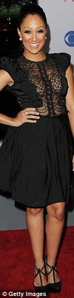 http://i.dailymail.co.uk/i/pix/2012/01/12/article-0-0F6C2E1B00000578-497_148x595.jpg