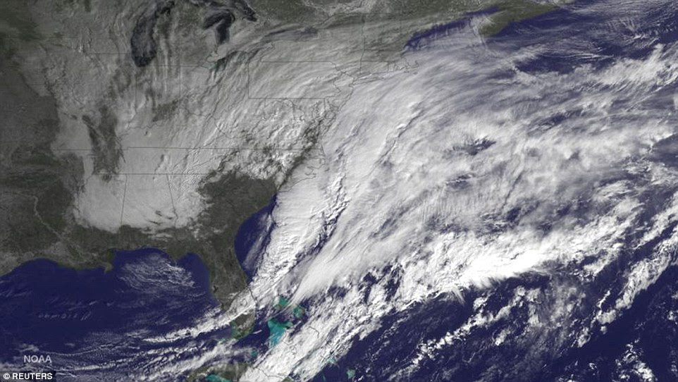 Winter storm Juno can be seen covering the Northeast of the U.S. in a satellite image released on Monday. Several feet of snow was expected across the region 