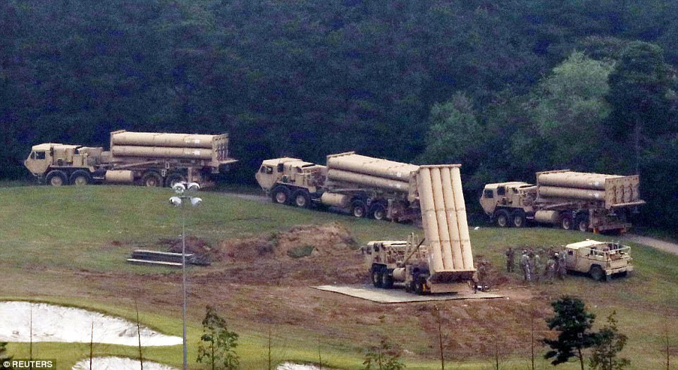 Meanwhile, a convoy of US military trucks carrying four launchers for the Terminal High-Altitude Area Defense (THAAD) system made their way through an activists' blockade at a former golf course in the southern county of Seongju