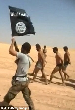 There were chants of 'Islamic State', to which the men replied 'It will remain', their hands behind their backs
