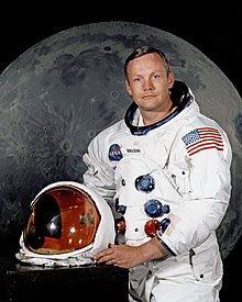 Photo of Neil Armstrong, July 1969, in space suit with the helmet off