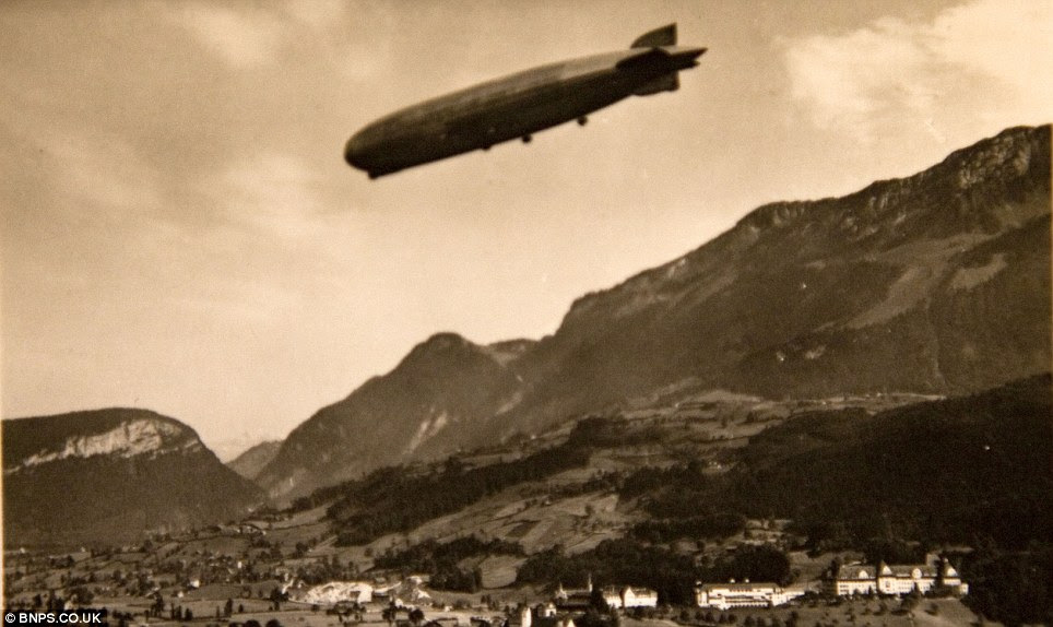 Flight of fancy: Mr Kirch's collection of Zeppelin memorabilia is so vast he planned to open a museum, but he never got around to finishing the project. Pictured, an airship over Austria