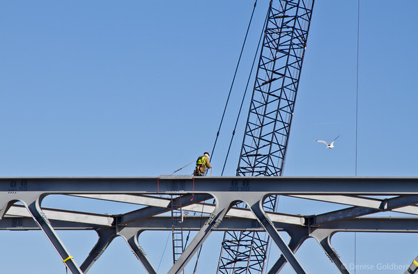 working high, on the Portsmouth span of the new Memorial Bridge