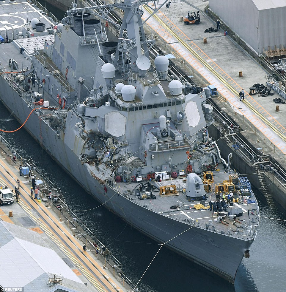 The USS Fitzgerald is seen in a dock in Yokosuka, Japan, before it was moved to a dry dock so the damage done in last month's crash could be examined