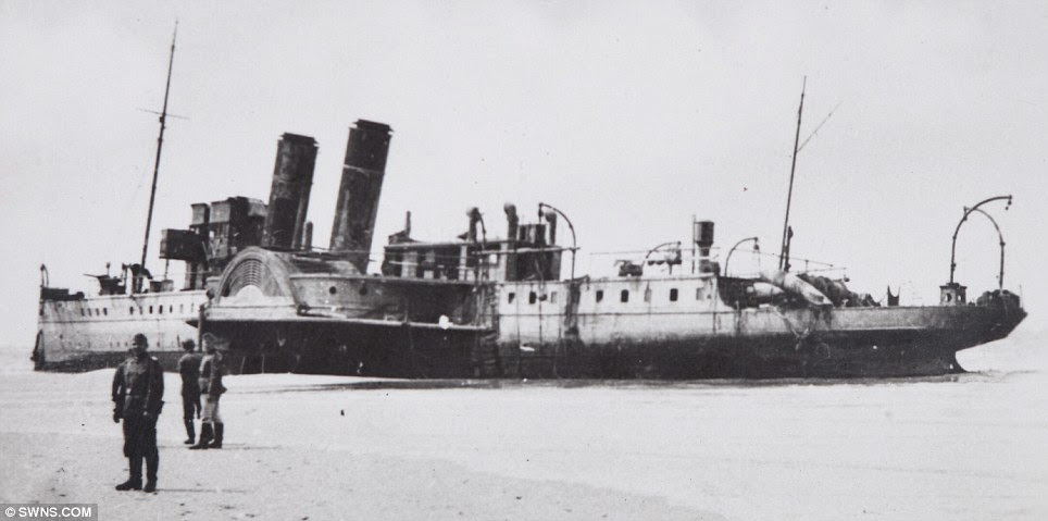 An abandoned paddle streamer is pictured abandoned elsewhere on the beach at Dunkirk