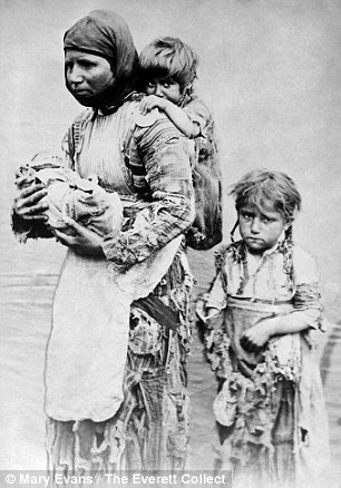 Armenian widow with 3 children seeking help from missionaries in 1899. Her husband was killed in the aftermath of the Armenian Massacres of 1894-1896