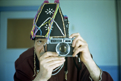 reflected self-portrait with Yashica Electro 35 GSN camera and Thai hat by pho-Tony