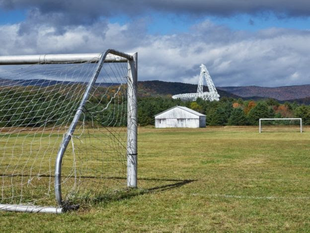 Football pitch with GBT telescope in the background