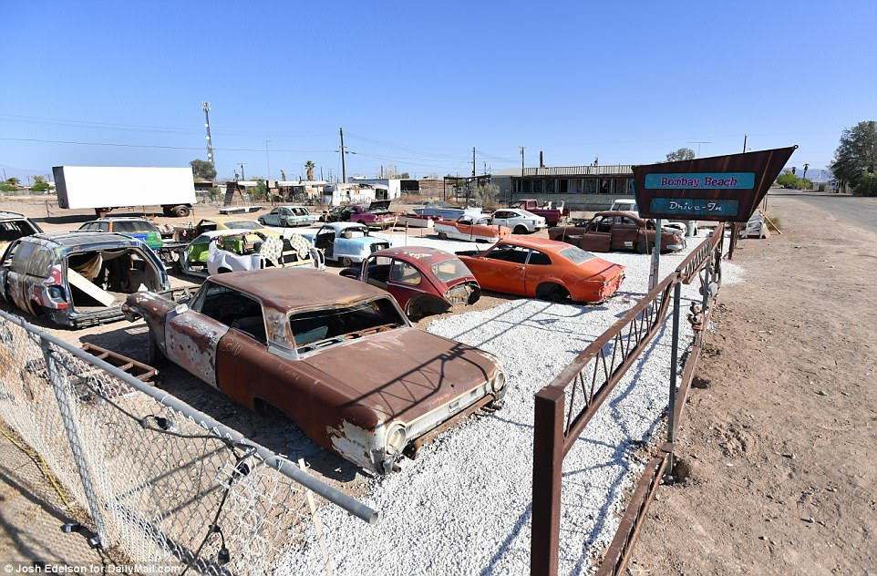 Wrecked cars from the 1950s and 60s can be found scattered in a lot at what's called the Bombay Beach Drive-in. Unclear if it still operates, but the area has now become a favorite site for those who tour the area since it is has high levels of aesthetically pleasing levels of urban decay