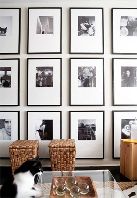 Key to Great Black and White Gallery: symmetrical grid, oversized frames, off centered mats.