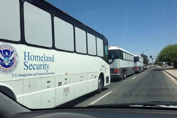 DHS buses carry immigrants from the border to detention centers where they are processed, given a court date and released.