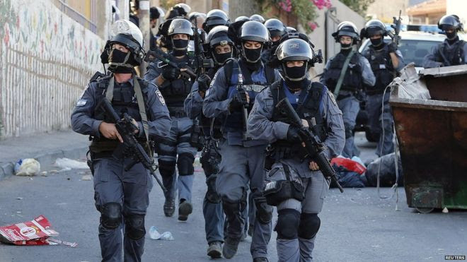 Israeli police patrol a neighbourhood in Jerusalem