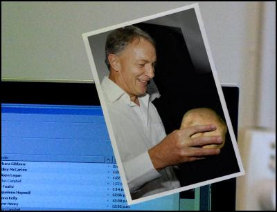 phil goff holding a potato