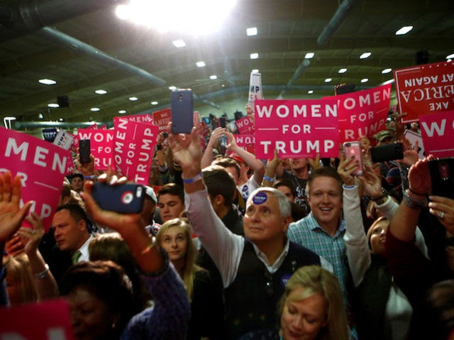 FLETCHER, NC - OCTOBER 21:  Supporters of Republican presidential candidate Donald Trump cheer as he takes to the stage at a rally on October 21, 2016 at the Western North Carolina Agricultural Center in Fletcher, North Carolina. Trump continues to campaign for his run for president of the United States. (Photo by Brian Blanco/Getty Images)
