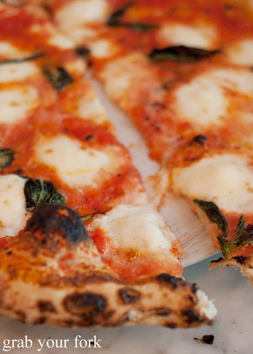 melted stretchy mozzarella cheese on margherita pizza at motorino pizza east village italian new york pizza ny usa