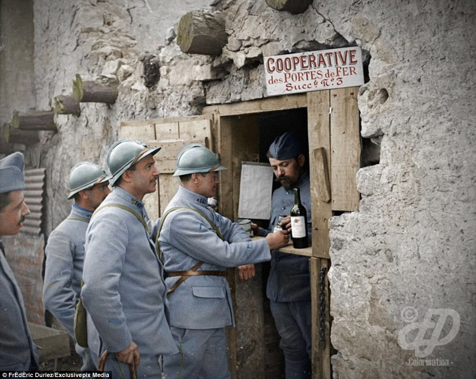 The phrase 'Cooperative des Portes de Fer' means 'Cooperative canteen of the Iron Gates', which is a reference to the 161th Infantry Regiment surname  of 'Regiment des Portes de Fer'. This regiment surname was given during the last phase of the Battle of the Somme in October to November 1916. It was the name of a German trench, called Iron Gates trench, in a very strong position in the sector of Rancourt and Sailly-Saillisel - captured by the men of the French 161th Infantry Regiment