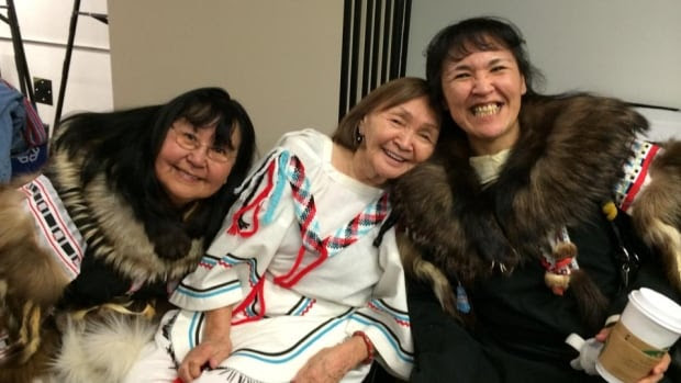 From left to right, Annie Aleequq, Minnie Freeman and Debbie Gordon-Ruben waiting to get into the Truth and Reconciliation Commission of Canada event in Edmonton. 