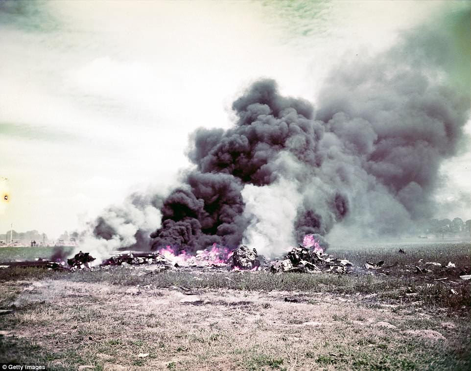 The wreckage of an Allied plane that crashed during the fighting in Normandy, either during the landings or the battles that followed. Whatever is left is burning