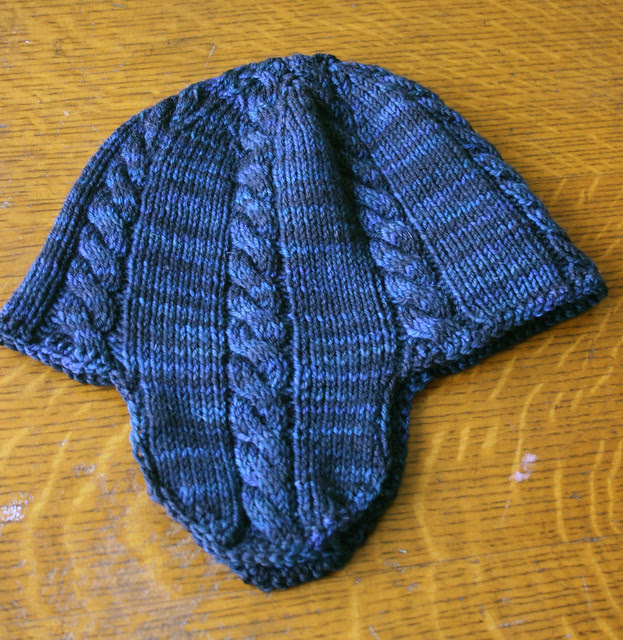 Stormy cabled earflap hat