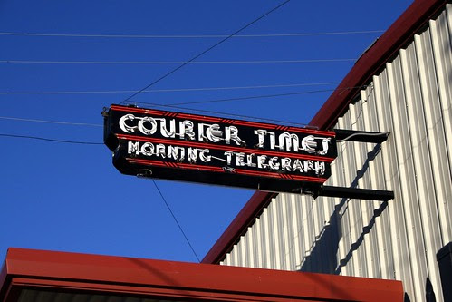 courier times neon sign