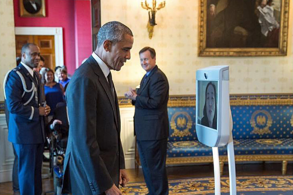 President Obama greets Alice Wong via robot