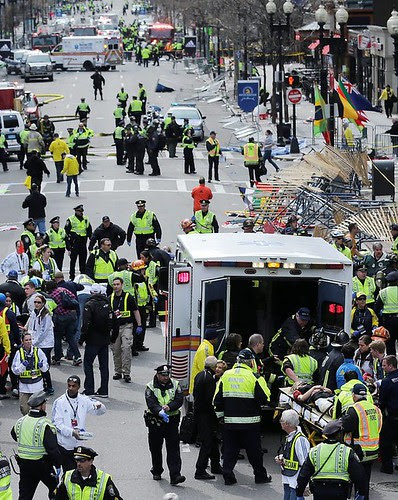 Aftermath of two bomb blasts at the Boston Marathon finish line. Two people were initially reported killed and many others injured.